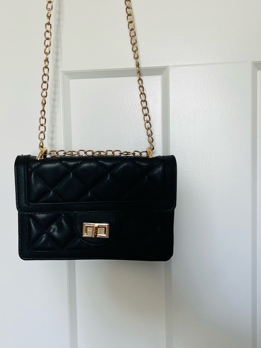 Quilted Black Chain Shoulder Bag with Gold Hardware